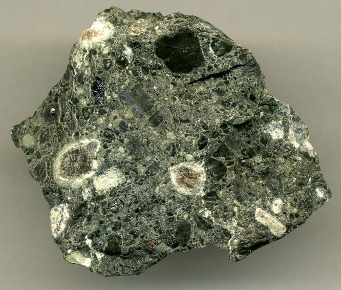 This is a natural piece of kimberlite with a rough Diamond still